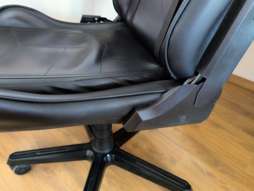 a gaming chair with removed armrests